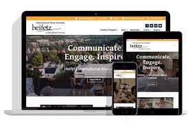 A showcase of Digital Minerva's work on the Heifetz website, showing the site on three different devices 